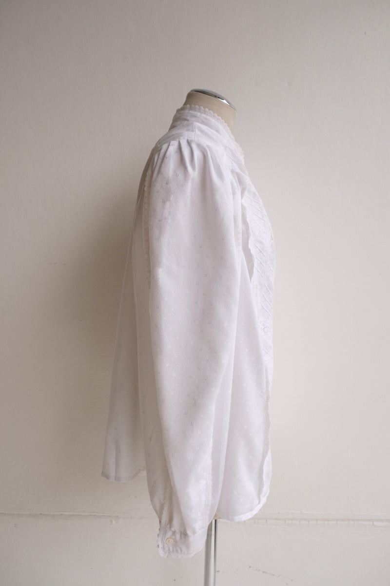high neck frill blouse
