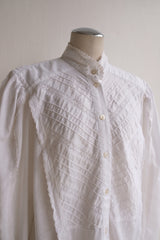 high neck frill blouse