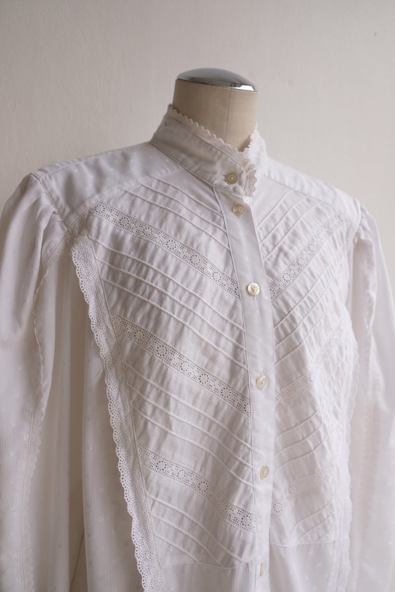high neck frill blouse