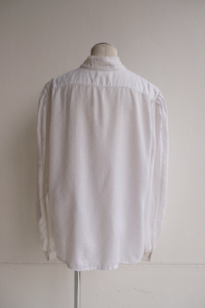 high neck frill blouse