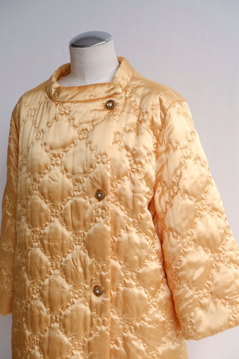 60's yellow gold quilted coat
